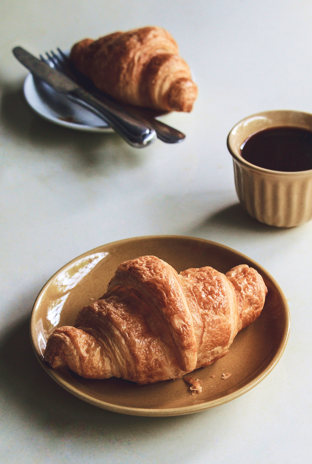 Croissants and coffee served for breakfast