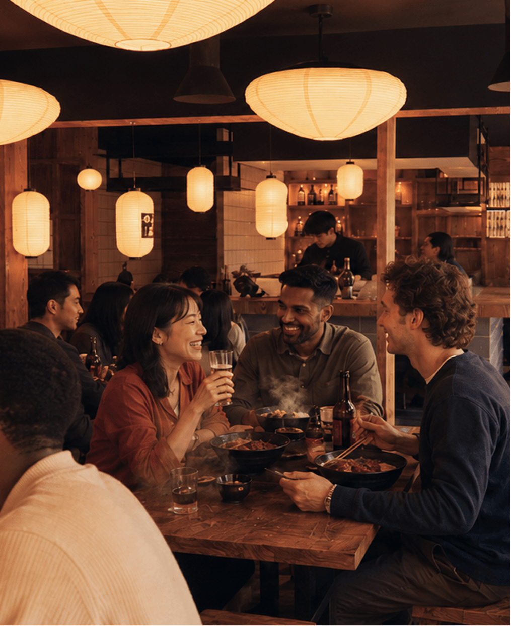 Friends eating at a Japanese restaurant in Edinburgh